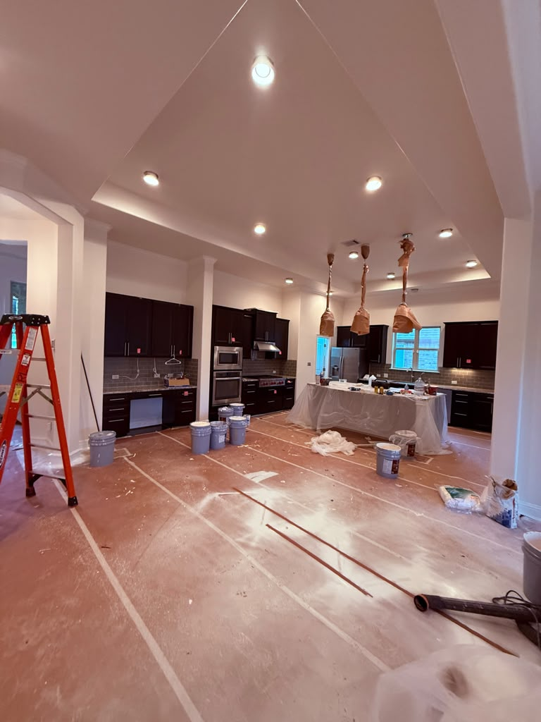 Kitchen interior being painted by LAX Drywall N Painting